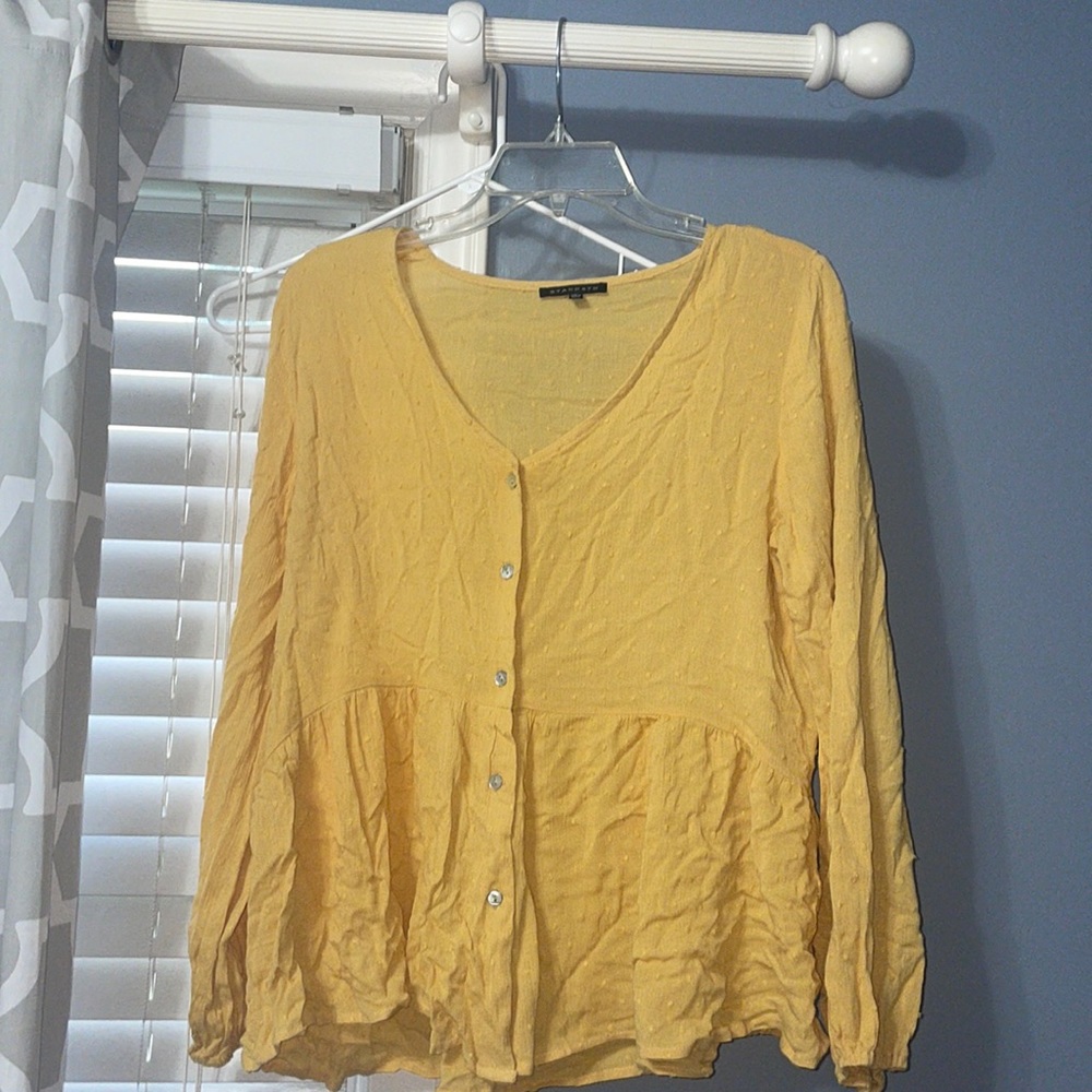 Yellow button up shirt